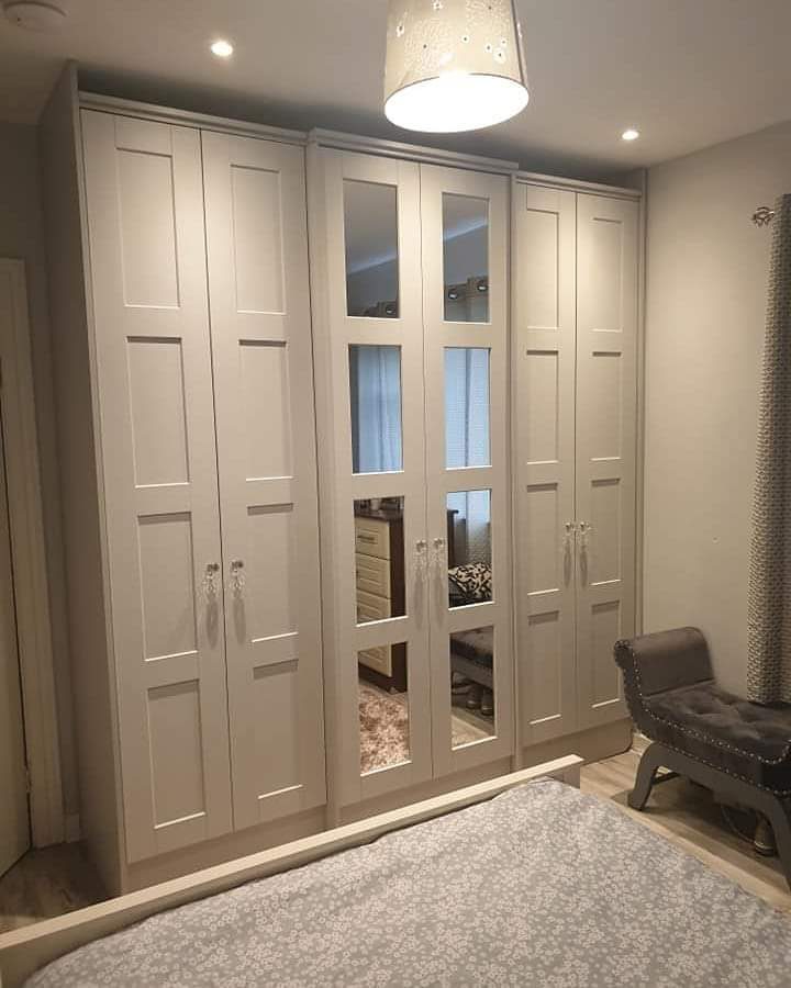 Grey shaker wardrobes with mirrored doors fitted in a Dublin bedroom