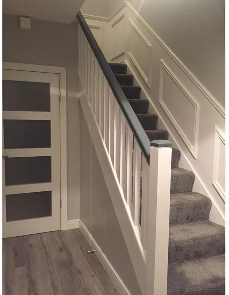 Wall panelling up the stairs